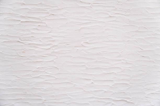 istock Loft-style plaster walls, gray, white, empty space used as wallpaper. Popular in home design or interior design. with copy spaces. 2117399032