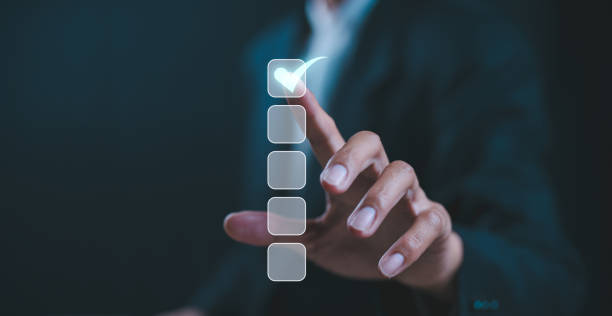 istock Business performance checklist, businessman using smartphone doing online checklist survey, filling out digital form checklist. 2117443336