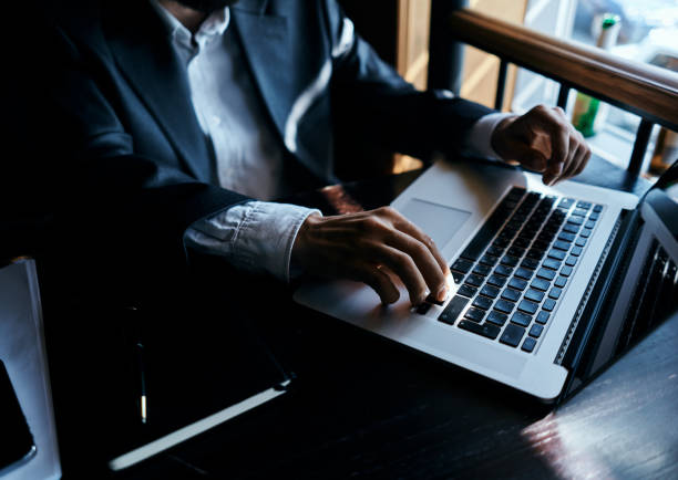 istock business man working on laptop in cafe office 2117459964