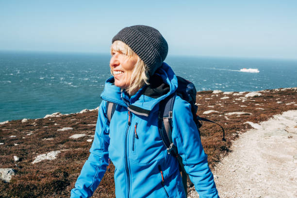 istock Senior woman on Anglesey, North Wales, UK 2117487914