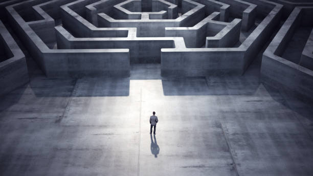 istock Businessman heading towards Hexagon shaped maze, Success Concept 2117493210