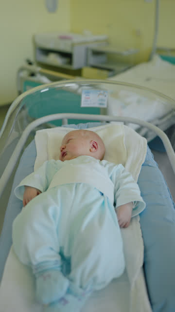 WS New Beginnings: Introducing Newborn Baby Boy in Hospital Crib at Maternity Ward
