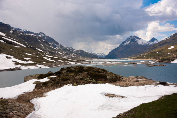 istock Mountain lake with ice in Switzerland in spring 2117556320