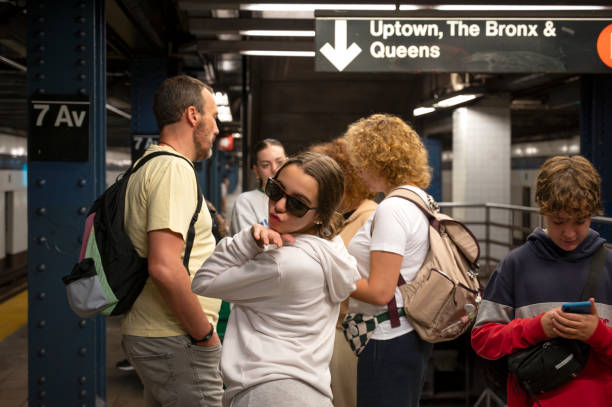 istock Family Navigating Through NYC Subway Station 2117562895