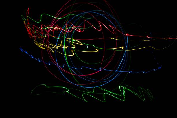 istock Moving swirls of colored lights 2117568413