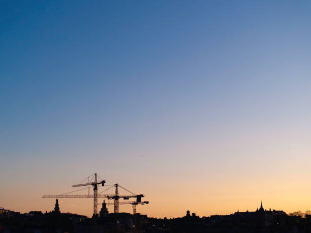 View of a construction site in the setting sun.