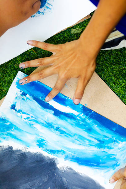 istock Art workshop finger painting of thai student 2117619266