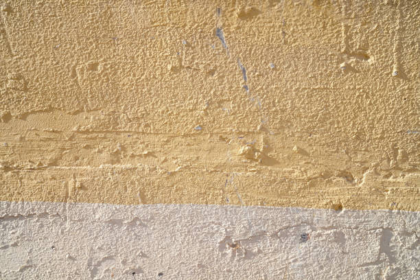 istock Cement Wall with two color white and light orange for background and inspiration 2117634178