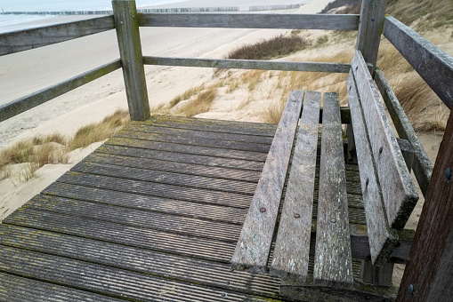 wooden bench on a dune