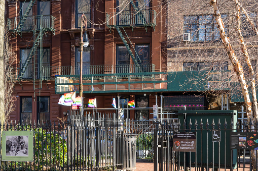 Christopher Park, Greenwich Village, Manhattan, New York, USA - March, 2024.  Christopher Park, which has played an important role in the history of the LGBT rights movement. The Stonewall uprising and other LGBT-related revolve around this Inn.
