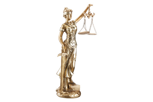 Statue Of Justice Over White Background