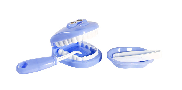 A set of blue and white dental tools, color combination gives a sense of cleanliness and sterility.
