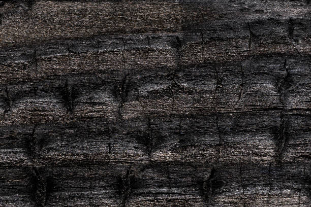 istock Overhead view of black wooden table 2117697980