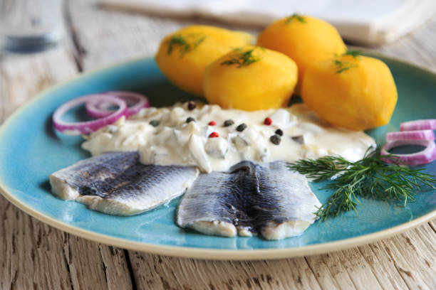 Herring in cream sauce and potatoes