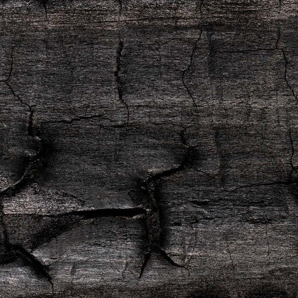 istock Overhead view of black wooden table 2117714661