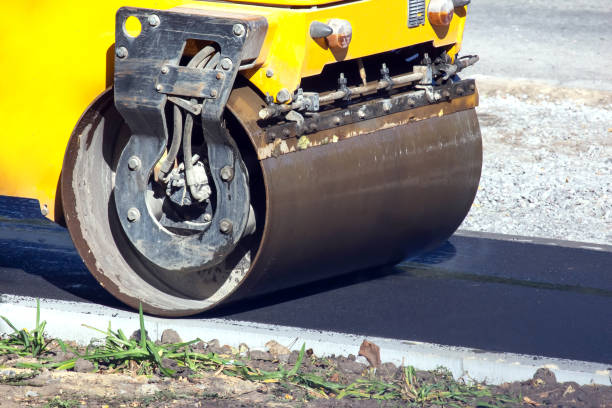 istock asphalt roller at work repairing a road for pedestrians 2117740544