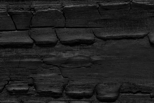 istock Overhead view of black wooden table 2117741670