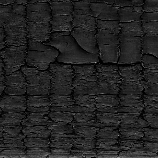 istock Overhead view of black wooden table 2117742796