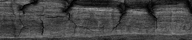 istock Overhead view of black wooden table 2117757554