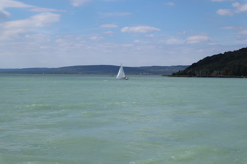 Sailboats take part in the annual Blue Ribbon race in Lake Balaton in the town of Siófok, Hungary on a sunny day.