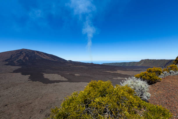errupting piton de la fournaise volcano on la reunion island, french overseas territory, france.