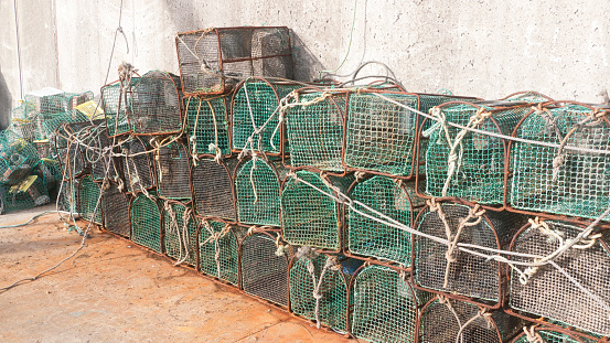 Fishing cages heap in a port
