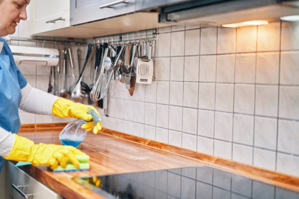 istock Domestic Cleaning Services -  Domestic Helper Cleaning Kitchen 2117887775