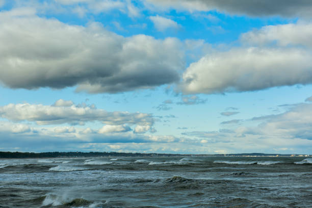 turbulent ocean splashes from waves sea and clouds.