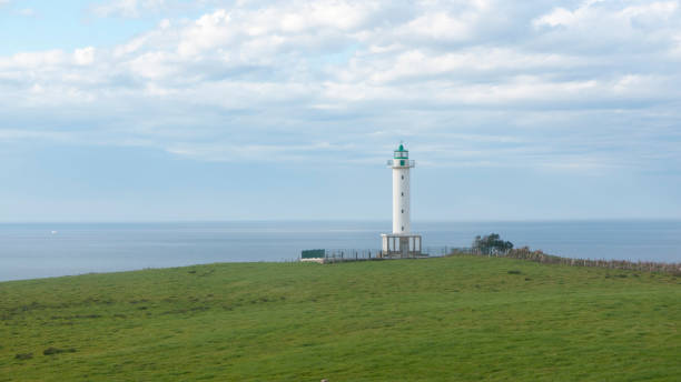 istock Little lighthouse in Asturias shore 2117903907