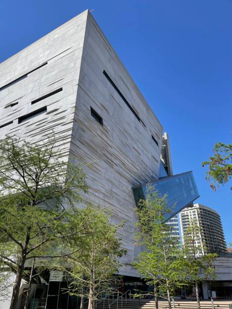 istock Low angle shot of a modern skyscraper in daylight 2117920966