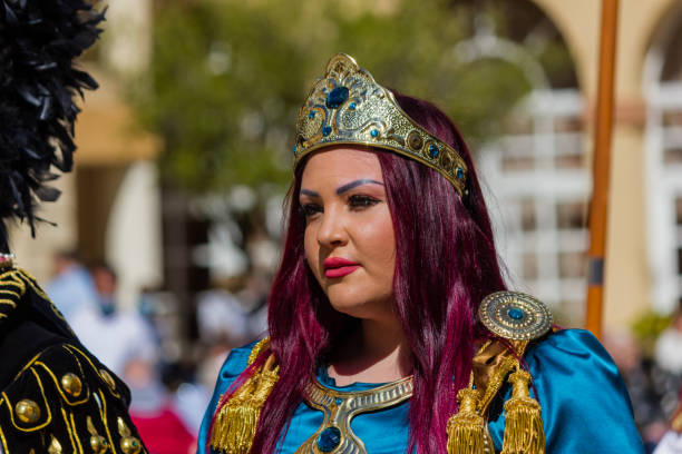 LUQA, MALTA - 17th March 2024. A woman at the Good Friday procession at St Vincent De Paul residence