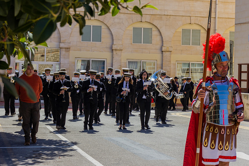 LUQA, MALTA - 17th March 2024. A  Small Group Of People at the Good Friday procession at St Vincent De Paul residence
