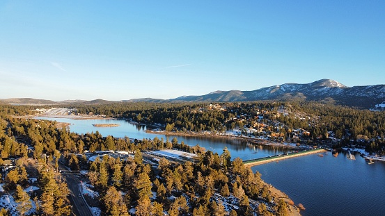 Drone shot of the Big Bear Lake during sunset in winter
