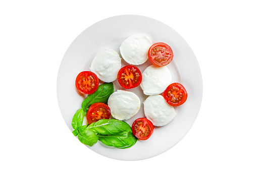 caprese salad mozzarella, tomato, basil fresh food tasty healthy eating cooking appetizer meal food snack on the table copy space food background rustic top view keto or paleo diet vegetarian food