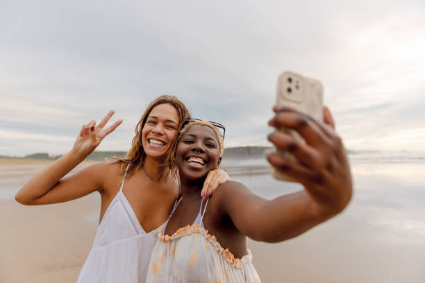 istock Two friends on the beach 2117995978