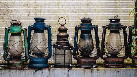 Collection of old brass rustic oil lamps