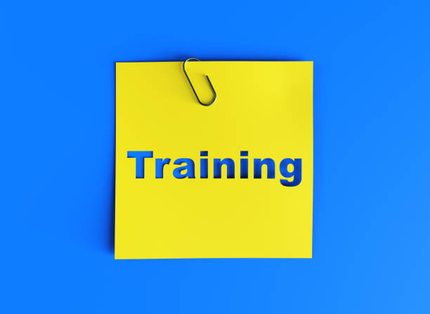 istock Word Training in Yellow Paper Concept 2118011947