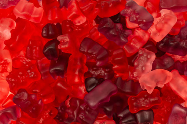 istock Assorted red gummy candies. Jelly bears. 2118028058