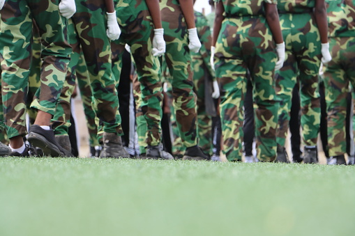 Independence Day Match past of students in various uniforms and ceremonial attires with black shoes and white socks in the greater Accra Region of Ghana