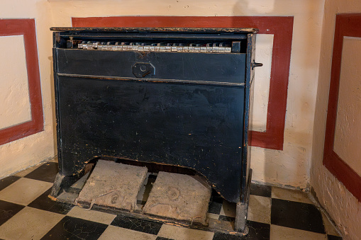 Old wood burning heating and cooking stove