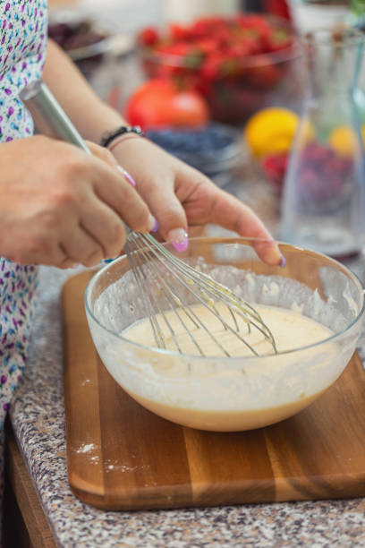 istock Woman Preparing Pancakes 2118096691