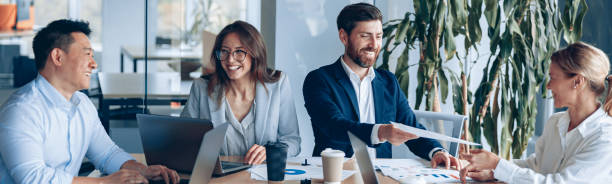 istock Creative and professional business team working on project in modern office 2118141970