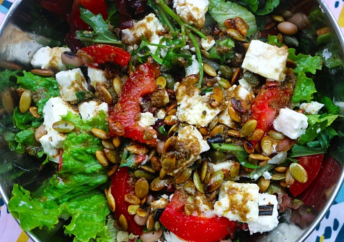 Experience the vibrant flavors and health benefits of a Greek style salad with feta