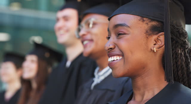 School, campus or happy graduates in ceremony or gowns standing in a line outside together. Diversity, faces or proud students with smile for motivation, college achievement or education success