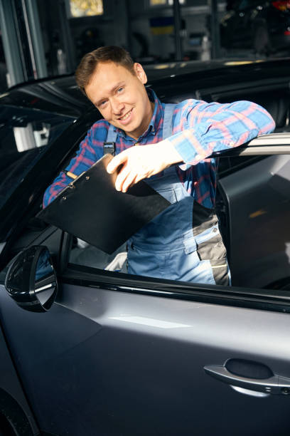 istock Professional employer performing work with transport in tire fitting 2118289390