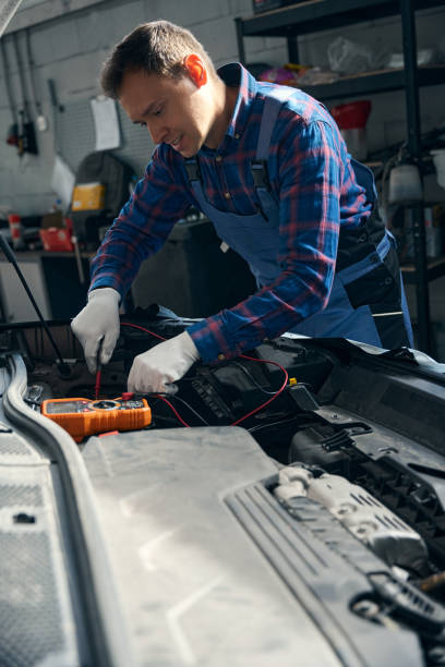 istock Professional male checking transport in tire fitting 2118289617