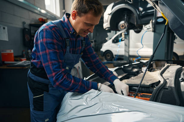 istock Professional man checking transport in tire fitting 2118289618