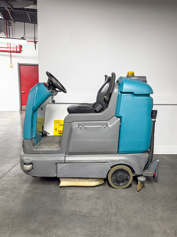 Professional cleaning vehicle in an office