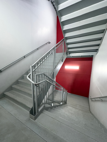 wide angle view of fire exit stairs of a modern apartment