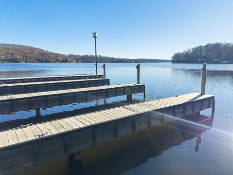 Empty decks side by side in a lake